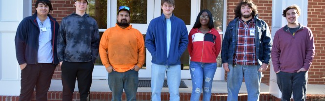 Apprenticeship Iredell students standing together for a group photo.