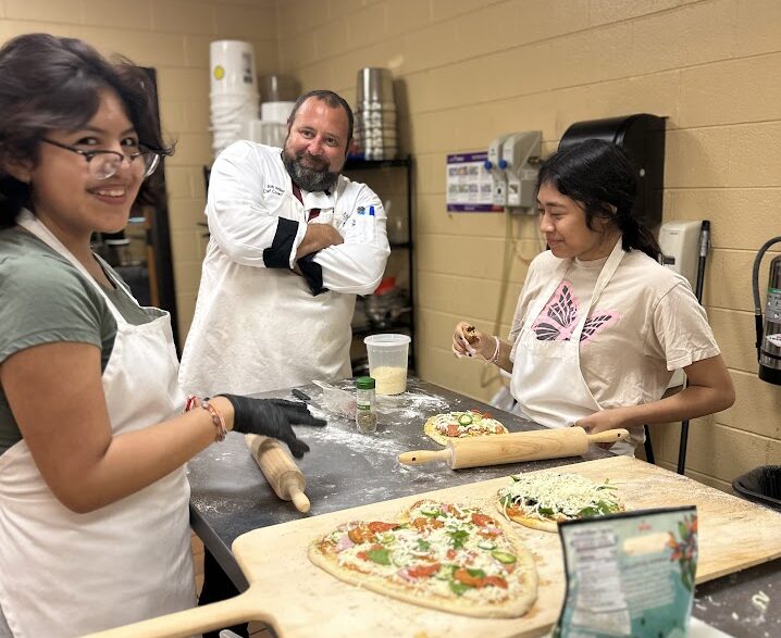 Mitchell Culinary Arts students making pizzas.